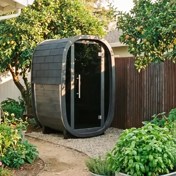Idle SM12 compact outdoor sauna in a garden